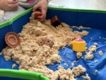 Kinetic sand with sandbox and moulds