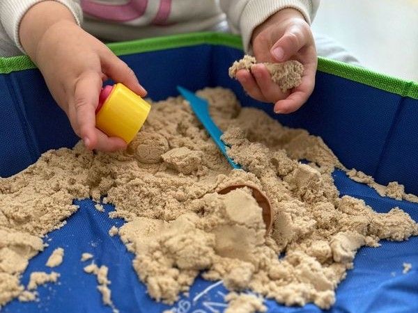 Kinetic sand with sandbox and moulds