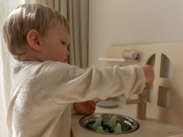 Children's wooden kitchen with window
