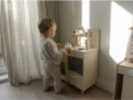Children's wooden kitchen with window